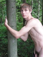 Wild forest twink posing completely naked outdoors