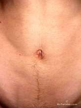 Big cock twink showing off in front of a camera