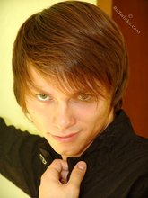 Twink dressed in all black starts undressing on cam
