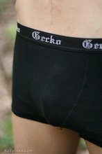 Dark-haired forest twink showing off his cock