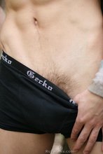 Dark-haired forest twink showing off his cock