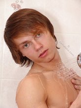 Feminine twink showering and showing his dick