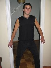 Cool dude takes off his black sleeveless t-shirt