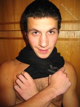 Cool dude takes off his black sleeveless t-shirt