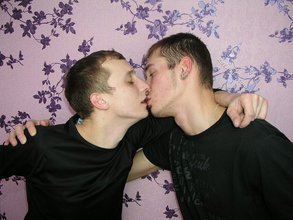 Dark-haired twinks passionately making out by the wall