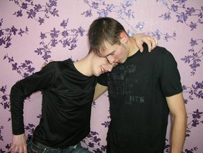 Dark-haired twinks passionately making out by the wall