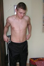 Cocky blond-haired twink cleaning up his cum on cam