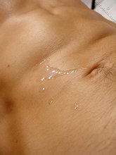 Horny twink blows a huge load all over himself