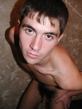 Hairy cock hottie showing off his ass and abs