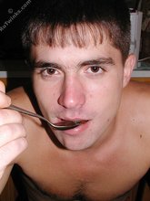 Playful twink drinking tea and showing his hairy ass