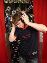 Young boy listening to his favorite tunes on cam