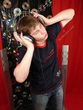 Young boy listening to his favorite tunes on cam