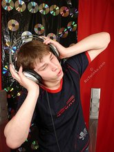 Young boy listening to his favorite tunes on cam