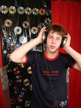 Young boy listening to his favorite tunes on cam