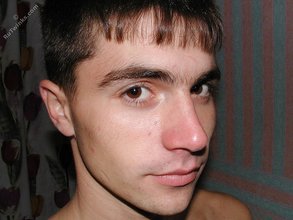 Dark-haired twink shows off his ass for the viewers at home