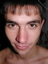 Dark-haired twink shows off his ass for the viewers at home