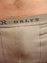 Coktease twink shows his tats and his puffy cock