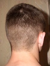 Serious-looking twink boy showing his meaty cock to you