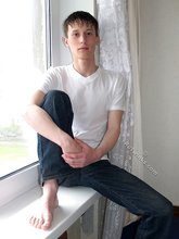 Cocky-looking brunette twink and his meaty cock/soles