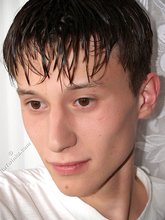 Cocky-looking brunette twink and his meaty cock/soles