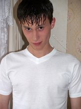 Cocky-looking brunette twink and his meaty cock/soles