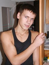 Wife-beater wearing twink boy shows off his impressive body