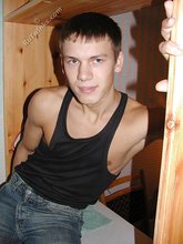 Wife-beater wearing twink boy shows off his impressive body