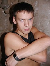 Wife-beater wearing twink boy shows off his impressive body