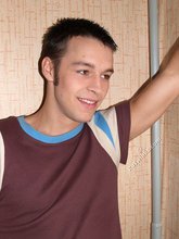 Colorfully dressed twink shows off that tight ass