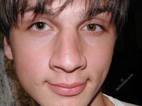 Pretty-looking twink making funny faces at the camera