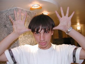 Pretty-looking twink making funny faces at the camera