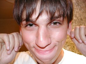 Pretty-looking twink making funny faces at the camera