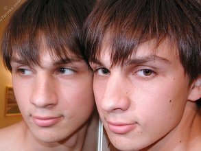 Dark-haired dude teasing his own junk on camera