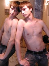 Dark-haired dude teasing his own junk on camera