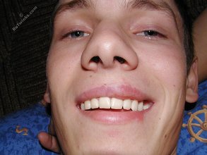 Big-dicked twink and his meaty cock shown up close