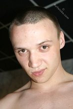 Balding twink shows off his sexy pecs and abs