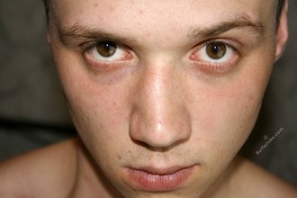 Balding twink shows off his sexy pecs and abs