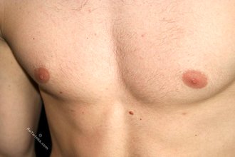 Balding twink shows off his sexy pecs and abs