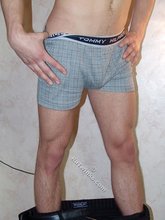 Blond-haired boy shows his bulge on camera