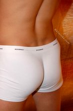 Jacked-up dude posing in white underwear, that's hot