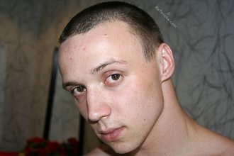 Hairy cock twink showing off on his big bed