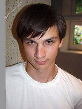 Dark-haired twink exposes that perfect body of his