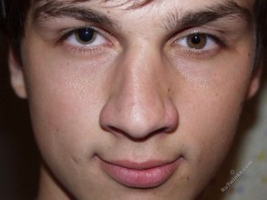 Dark-haired twink exposes that perfect body of his