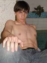 Dark-haired twink exposes that perfect body of his