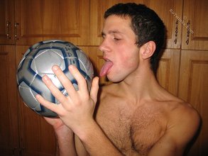 Football fan twink licks the ball and shows that ass