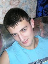 Blue shirt twink boy looks stoned out of his mind