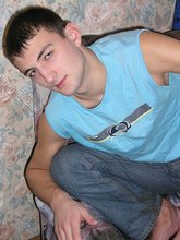 Blue shirt twink boy looks stoned out of his mind