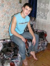 Blue shirt twink boy looks stoned out of his mind