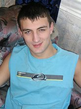 Blue shirt twink boy looks stoned out of his mind