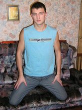 Blue shirt twink boy looks stoned out of his mind